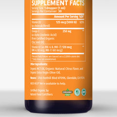NUSAVA vitamin dropper pouring a measured dose demonstrates easy administration