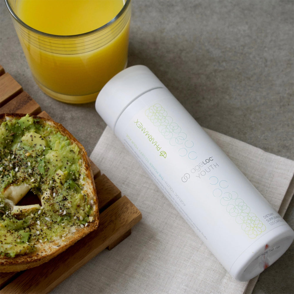 Nu Skin ageLOC Youth softgels in hand suggesting easy daily regimen