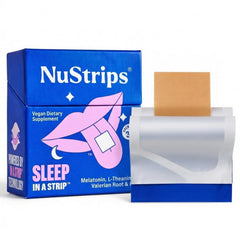 NuStrips sleep strip in blueberry flavor dissolving on tongue for quick rest