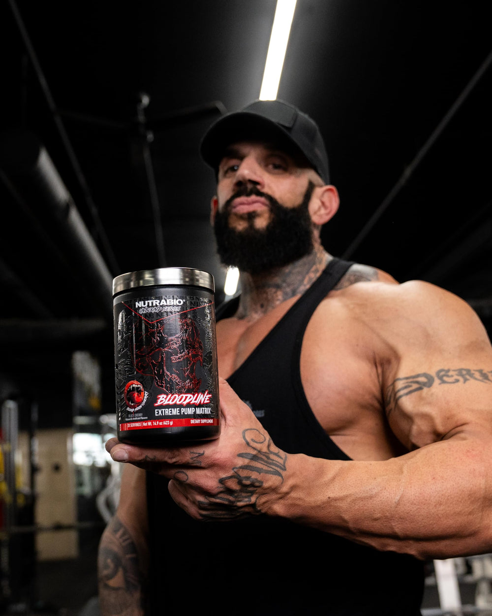 NutraBio Bloodline mix-water action shows quick pre-workout preparation for peak pumps.