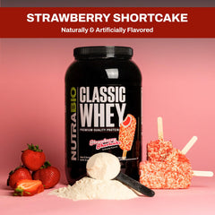 Milk being poured as NutraBio Classic Whey dissolves into a shake.