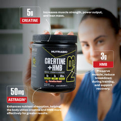 NutraBio Creatine + HMB Paradise Punch glass shows flavor and mix