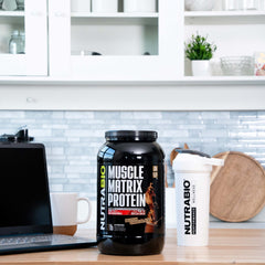 NutraBio Muscle Matrix Whey Isolate powder for fast protein delivery.