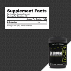 NutraBio L-Glutamine powder poured into a glass for mixing