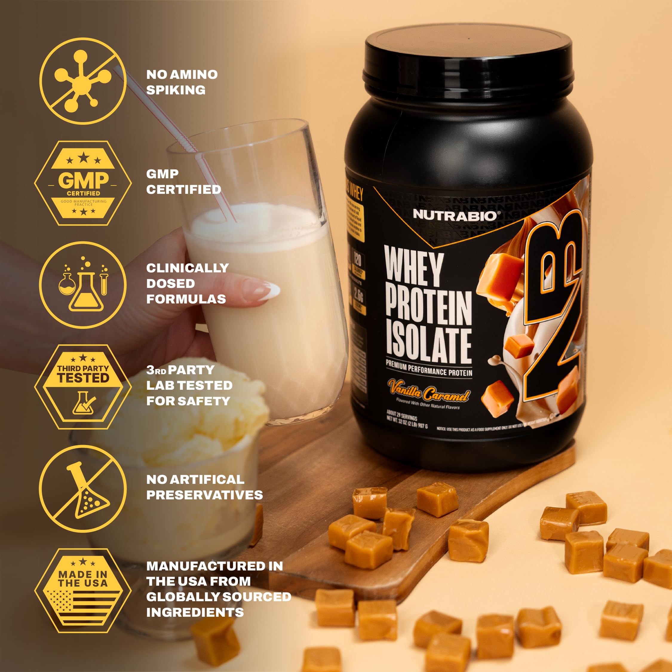 NutraBio whey isolate vanilla caramel powder poured into a glass with ice
