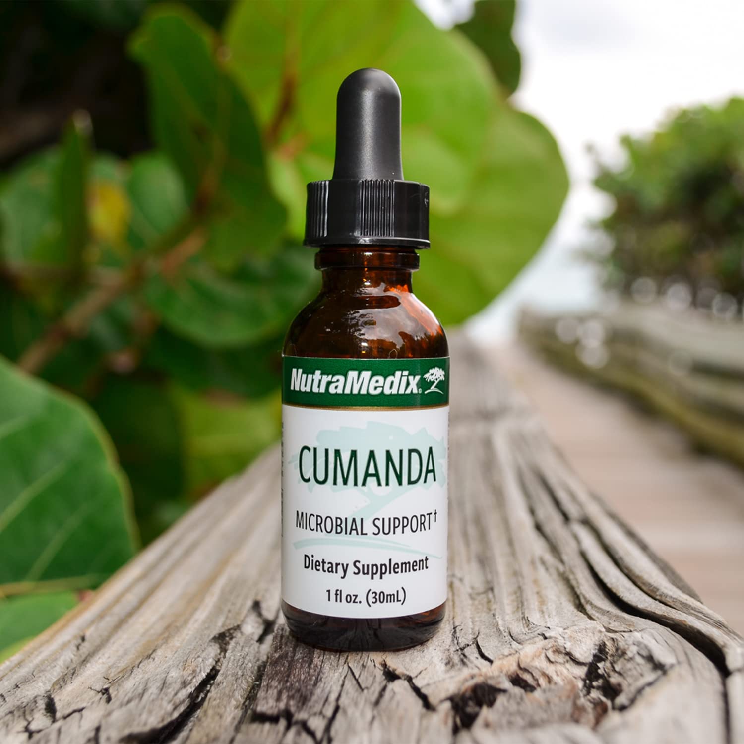 NutraMedix Cumanda bottle in a daily wellness routine setting.