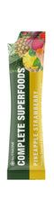 NutraOne stick pack being poured into water for quick greens.