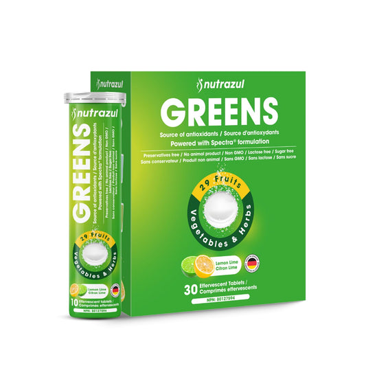 Nutrazul Greens effervescent tablet dissolving in water for a refreshing daily beverage.