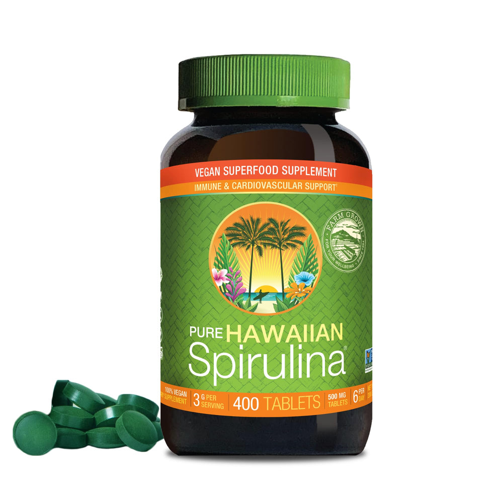 Nutrex Hawaii Pure Spirulina tablets in a bottle, emphasizing vegan protein and non-GMO.