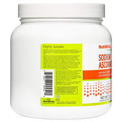 NutriBiotic sodium ascorbate on the kitchen counter suggesting simple supplementation.