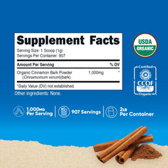 Nutricost Ceylon Cinnamon Powder scoop closeup showing fine texture.