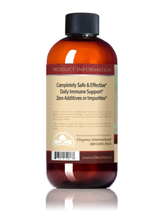 NutriNoche Organa nano colloidal silver being poured for easy daily use with high bioavailability.