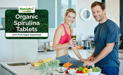 NUTRINPRO spirulina in glass bottle with spoon ready to take