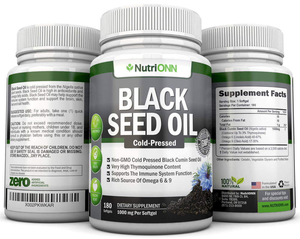 NutriONN Black Seed Oil in hand for skin and nails care