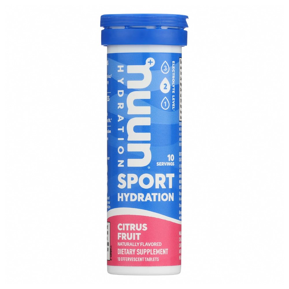 Nuun Active Citrus Fruit tablet dissolving in water for refreshing hydration.