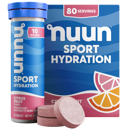 Nuun Citrus Fruit tablet dissolving in water for refreshing hydration.