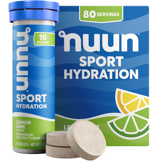 Nuun Lemon Lime tabs dissolving in water for crisp hydration on the go.