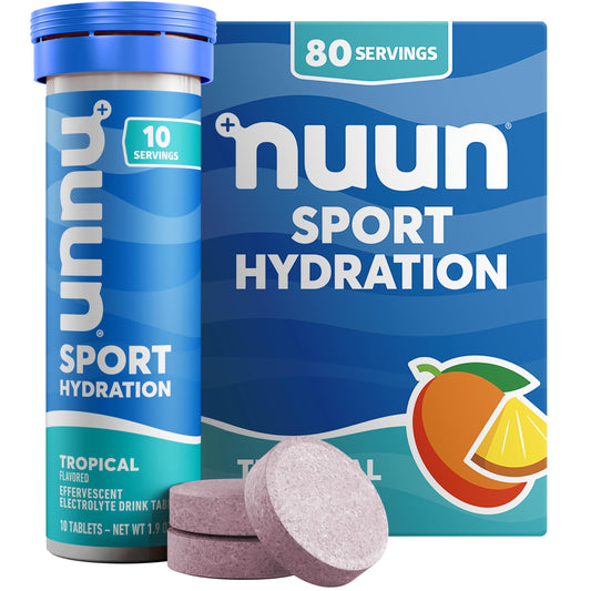 Nuun Sport Tropical tablet dissolving in water for refreshing hydration on the go.