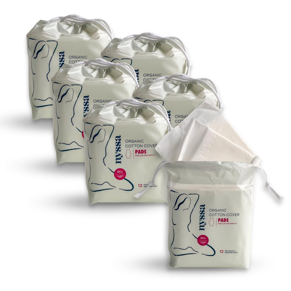 Nyssa regular pad with organic cotton topsheet for daily comfort and dryness.