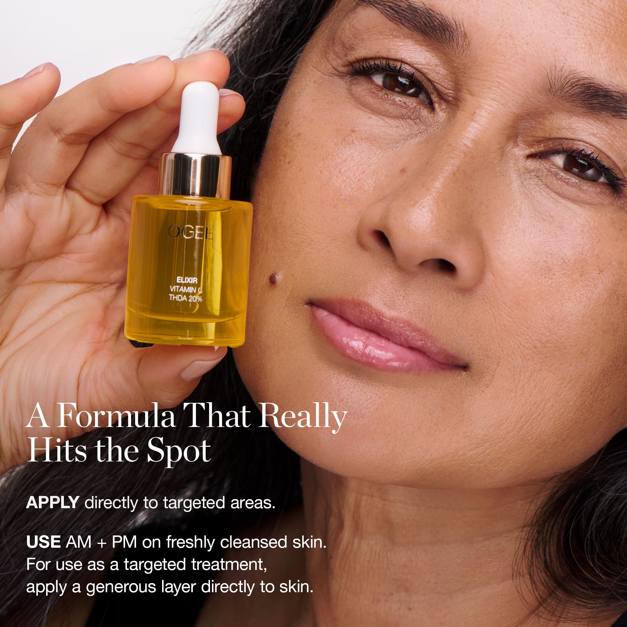 Ogee amber glass bottle signals premium organic skincare and safety.