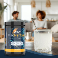 Ohoy MagPerform nightstand setup with bottle beside a lamp.