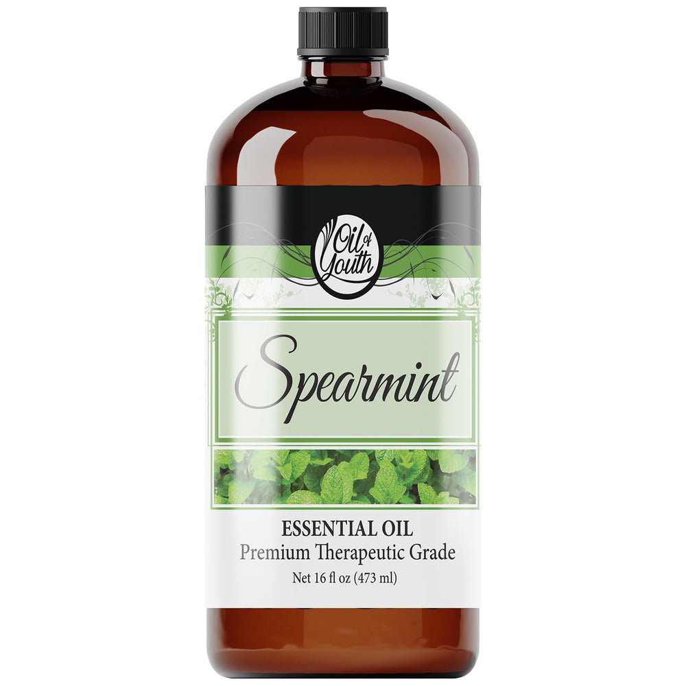 Oil of Youth Spearmint essential oil bottle pour for diffuser ambience.