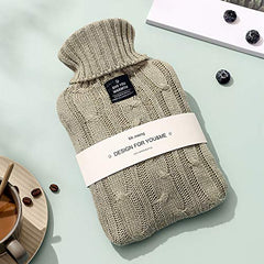 OliviaLiving hot water bottle in bed for long-lasting warmth at night.