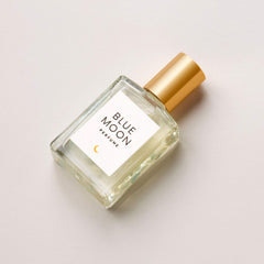 Olivine Atelier Blue Moon bottle ready for travel, long-lasting aroma on the go.