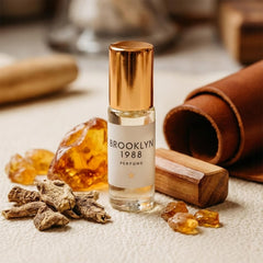 Smooth glide of Olivine Atelier mini perfume oil on pulse point for lasting aroma