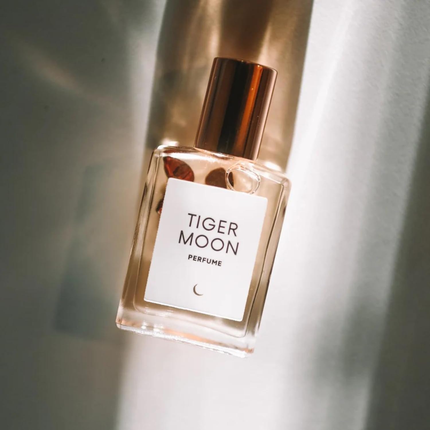 Olivine Atelier Tiger Moon travel-size bottle, ready for daily wear.
