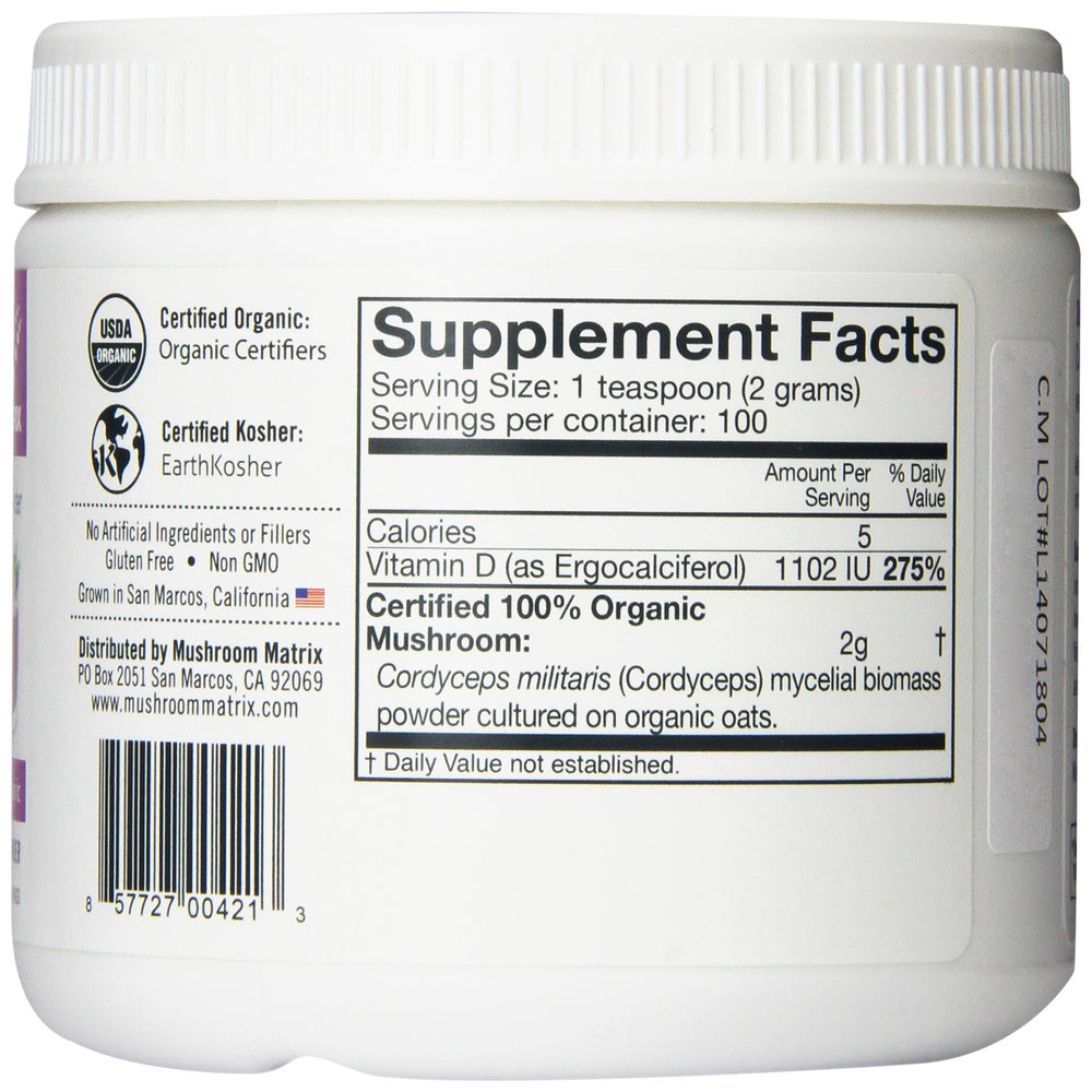 Cordyceps powder scoop beside smoothie for easy daily use with Om.