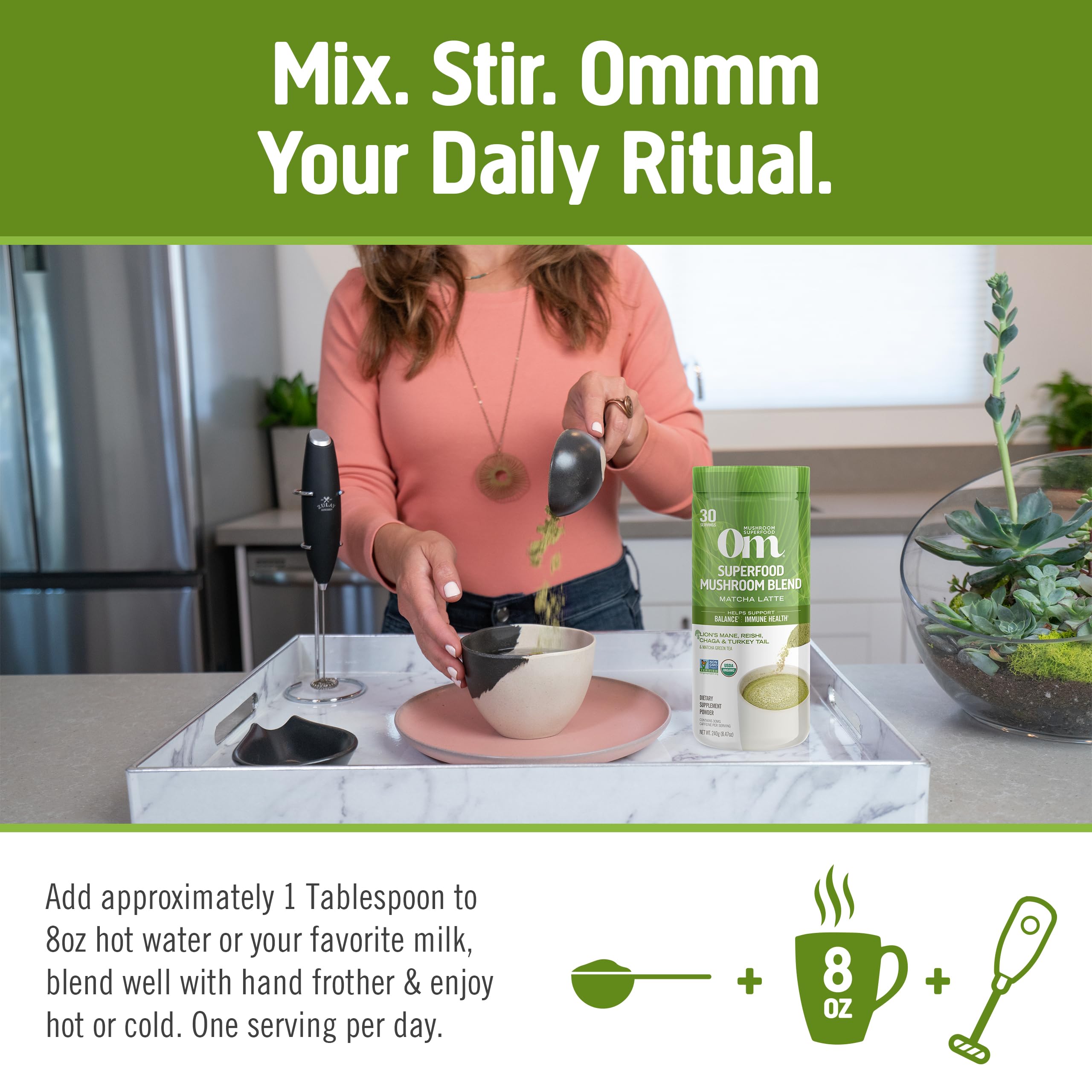 OM MUSHROOM SUPERFOOD oat milk powder packaging demonstrates creamy latte base for everyday enjoyment