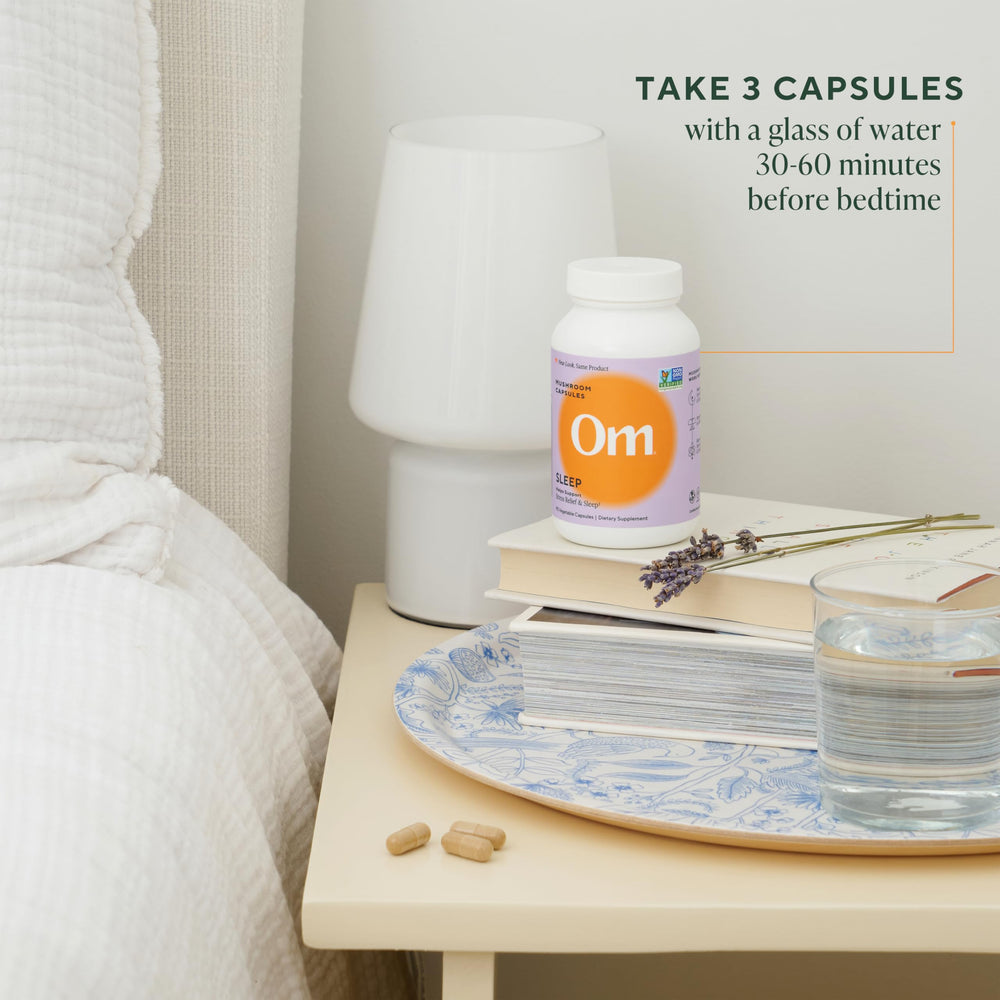 OM Mushroom Superfood Sleep Capsules label closeup highlights Reishi and melatonin.