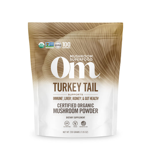 OM Mushroom Turkey Tail powder pouch front view for daily immune and gut support.