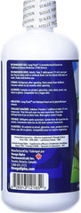Omega Alpha Lung Flush liquid in a glass ready to mix with water.