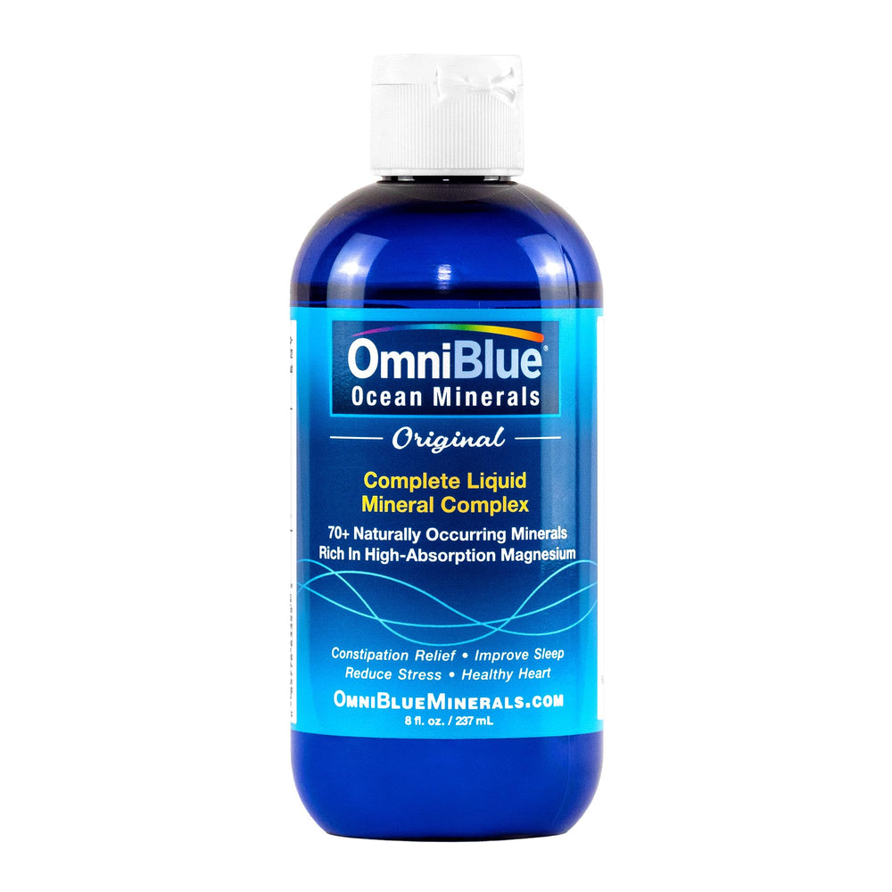 OmniBlue Ocean Minerals bottle poured into water for hydration support