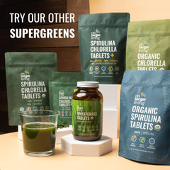 On Target Living spirulina-chlorella tablets displayed with glass of water.