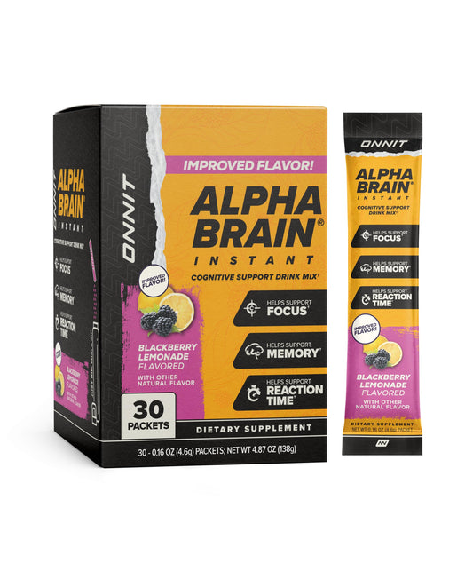ONNIT Alpha Brain Instant blackberry-lemonade packet in hand for on-the-go focus.
