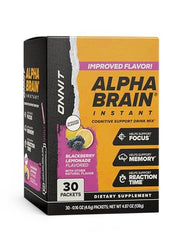 Pouring ONNIT Alpha Brain Instant into glass for easy mixing.