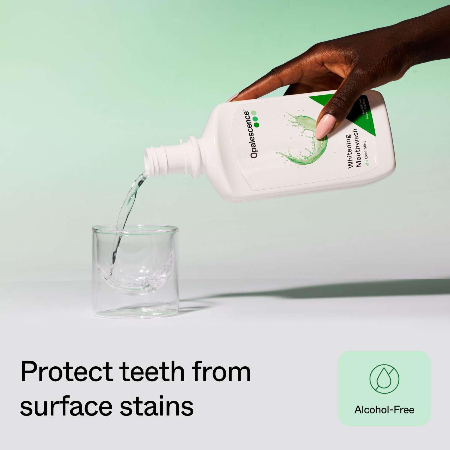 Opalescence mouthwash label close-up, highlights alcohol-free formula.