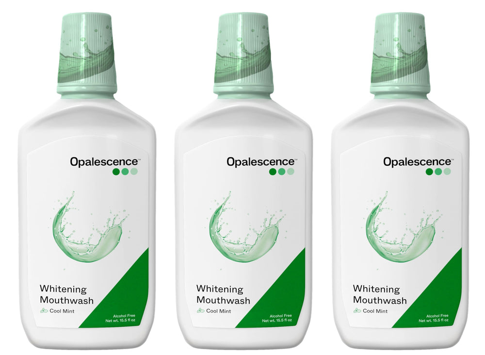 Opalescence whitening mouthwash bottle close-up, premium whitening formula.