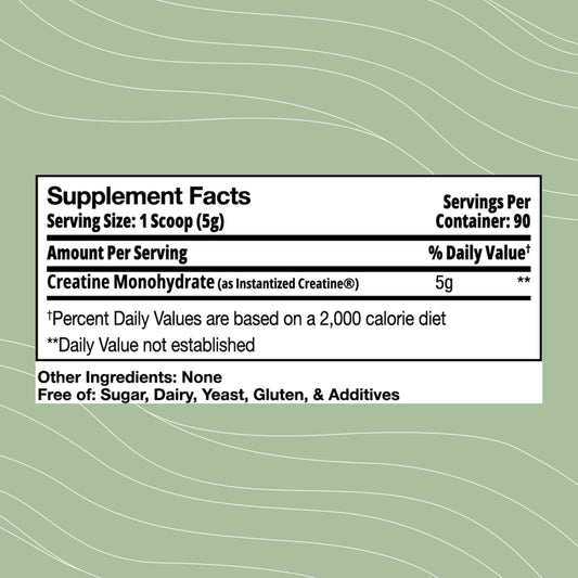 Optimal Health Systems Creatine mixed in a glass showing easy dissolution.