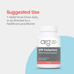 Optimox ATP Cofactors tablets close-up showing riboflavin and niacin.