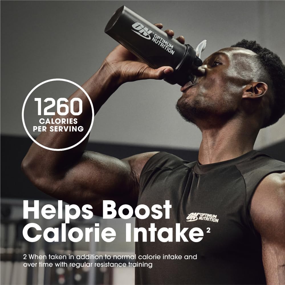 Optimum Nutrition Serious Mass blender with fruits illustrates shake customization.