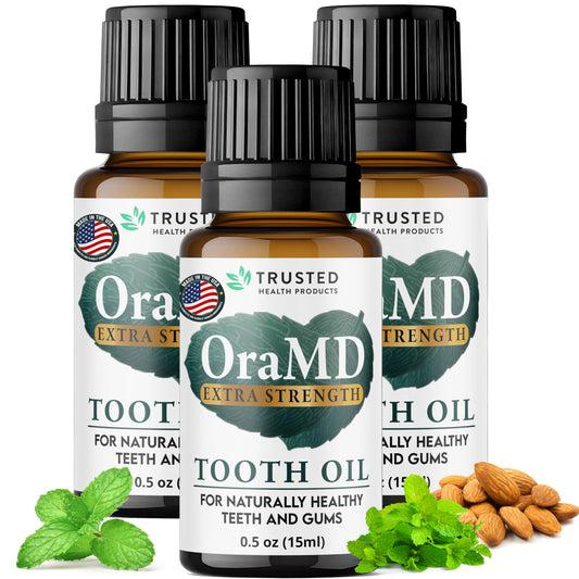 OraMD tooth oil bottle pouring for quick, fresh oral care at home.