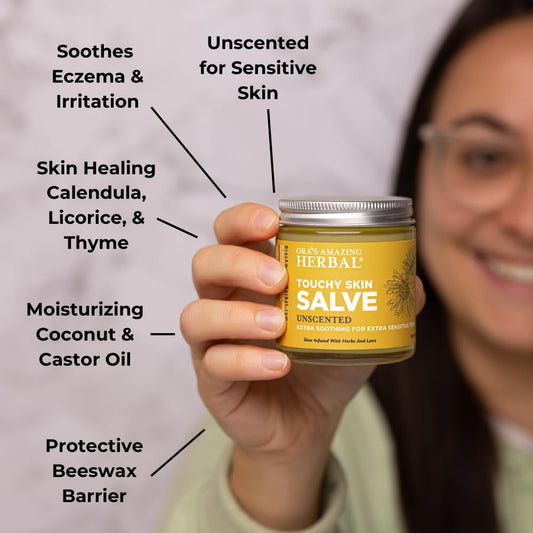 Ora's Amazing Herbal Touchy Skin Salve applied to irritated skin for gentle relief.
