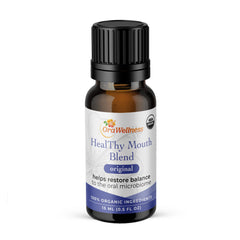 OraWellness Healthy Mouth Blend bottle pour for daily oil-based oral care