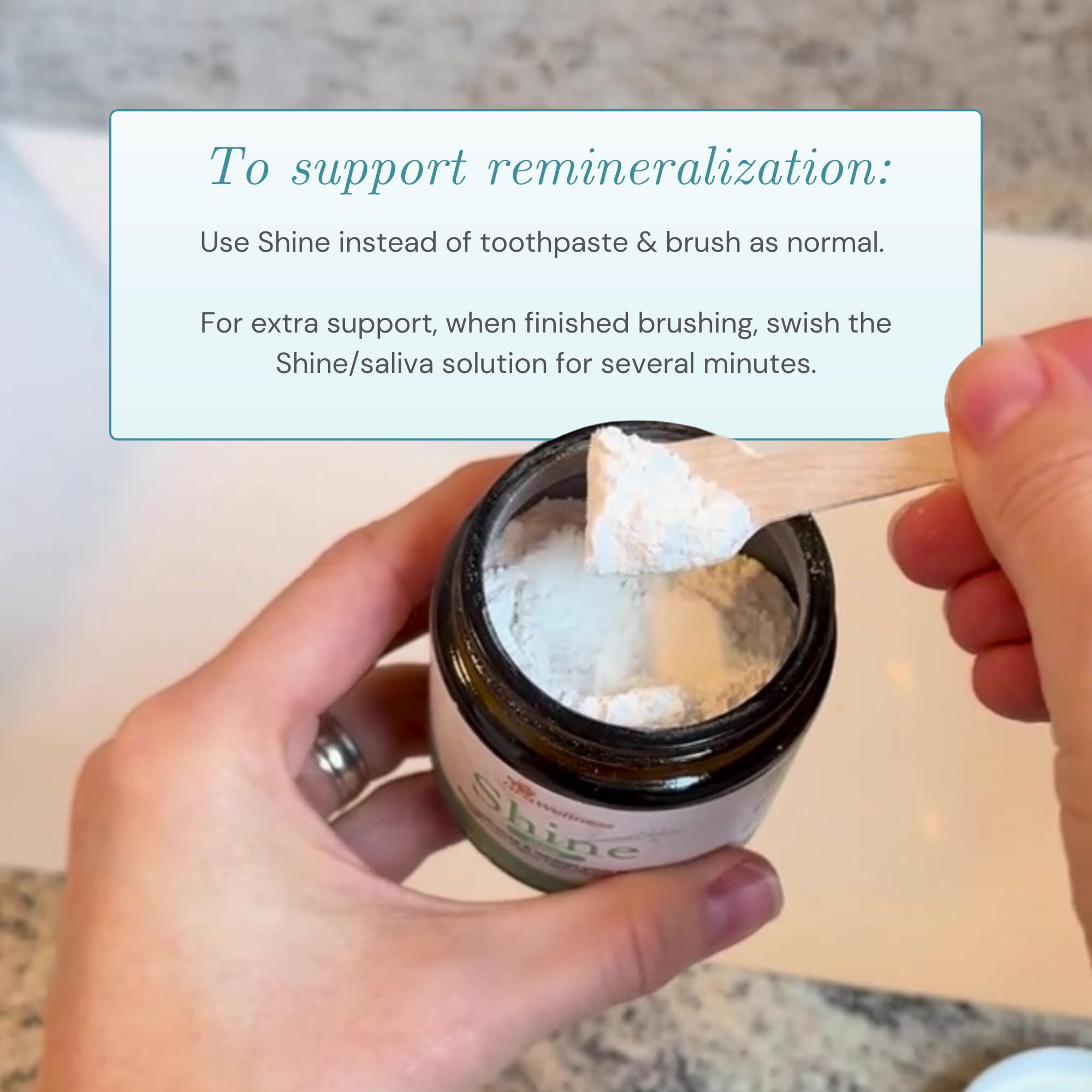 Brushing OraWellness Shine powder on a soft-bristled brush for daily care.