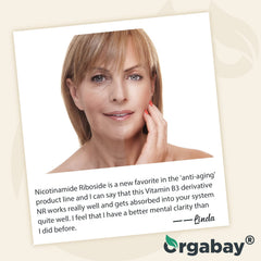 Orgabay capsules spilled on white background suggesting easy daily use.