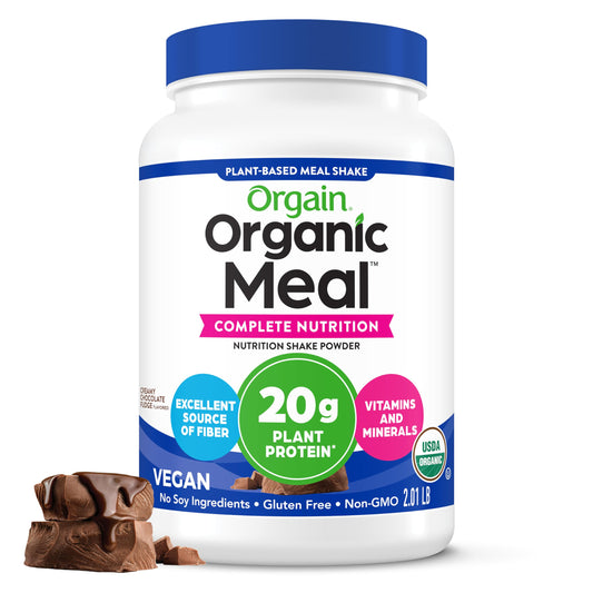Orgain organic meal powder in creamy chocolate fudge tub for quick shakes.
